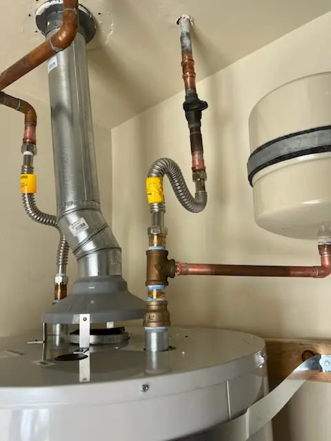 Water heater installation and plumbing repair in Four Mile Village